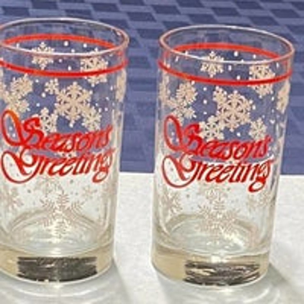 Set of two Season's Greetings holiday drinking glasses, retro Christmas snowflak